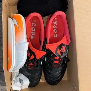 Adidas soccer shoes, socks and shin guards